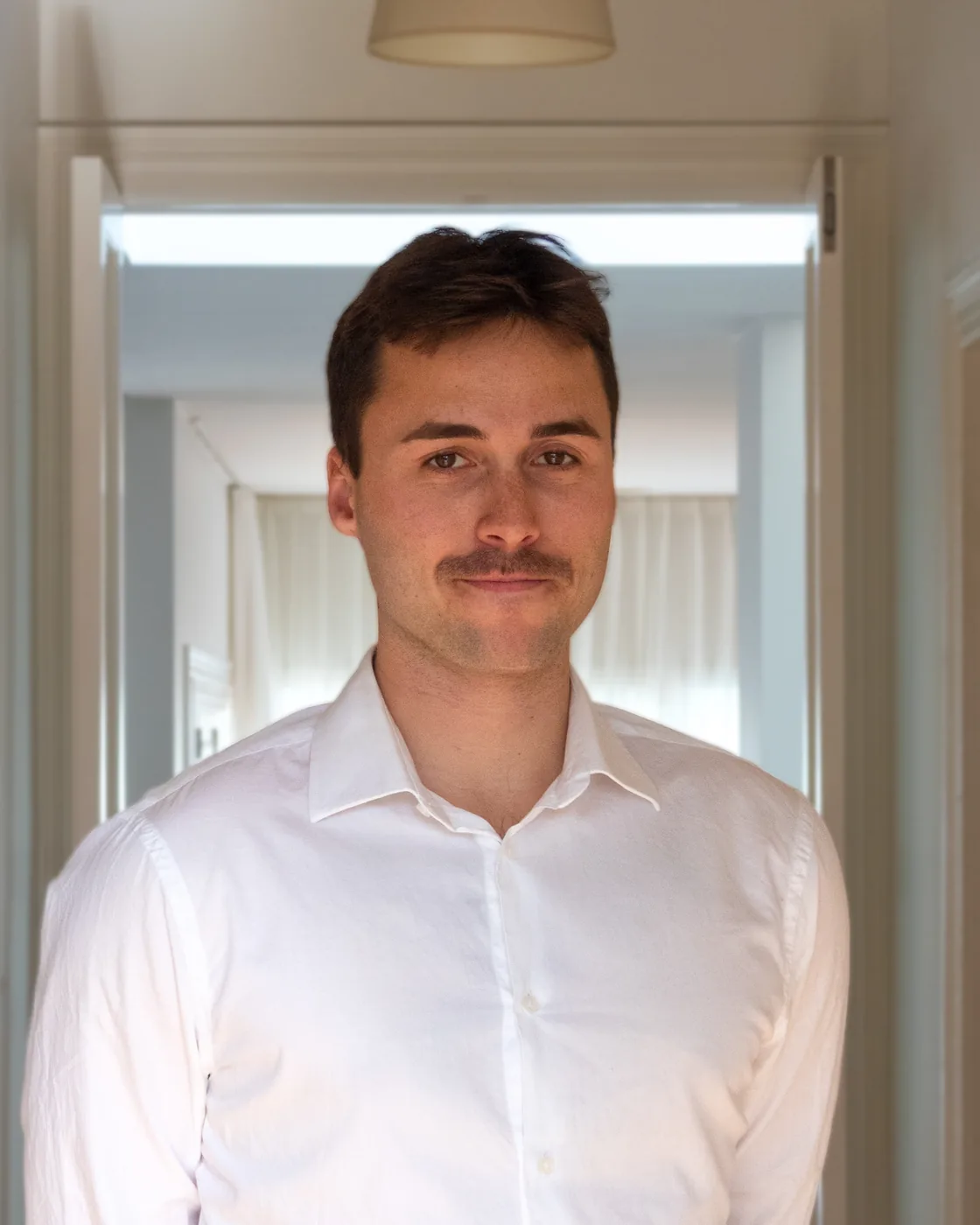 Lachlan Sallabank, a registered paramedic, in a white shirt